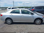 2010 Toyota Corolla Le Silver vin: JTDBU4EE1AJ087458