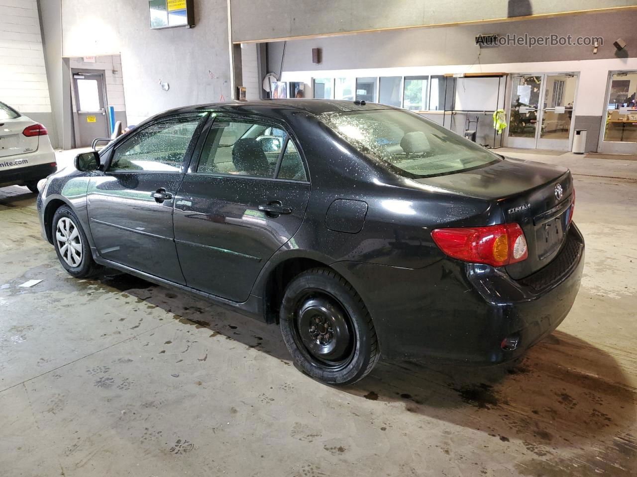 2010 Toyota Corolla Base Black vin: JTDBU4EE2A9119061