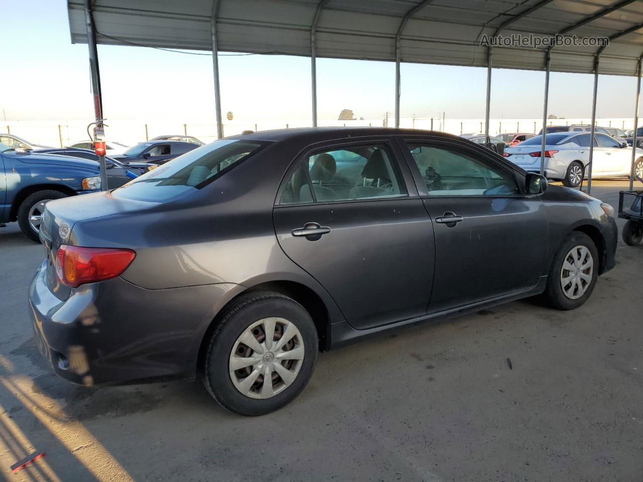 2010 Toyota Corolla Base Серый vin: JTDBU4EE3A9097362