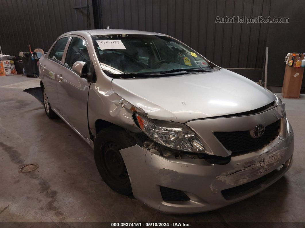 2010 Toyota Corolla Le Silver vin: JTDBU4EE3A9097877