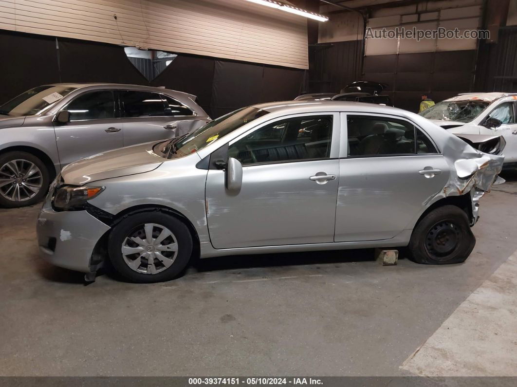 2010 Toyota Corolla Le Silver vin: JTDBU4EE3A9097877