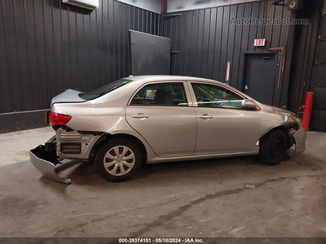 2010 Toyota Corolla Le Silver vin: JTDBU4EE3A9097877