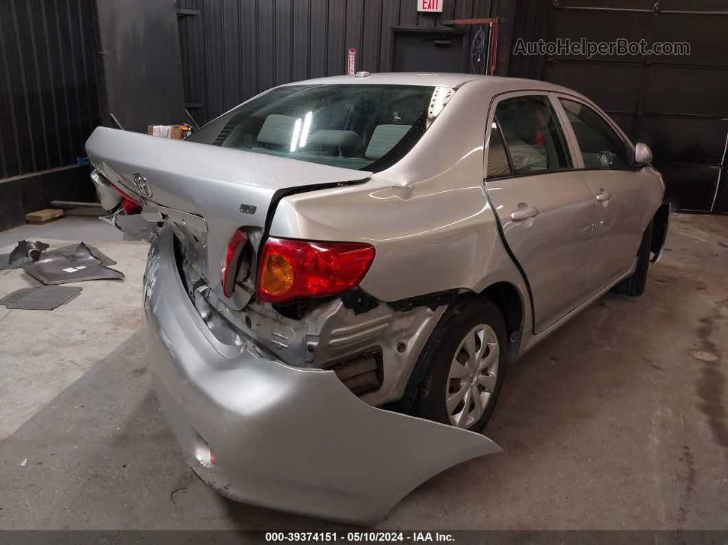 2010 Toyota Corolla Le Silver vin: JTDBU4EE3A9097877