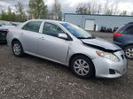 2010 Toyota Corolla Base Silver vin: JTDBU4EE8A9110560