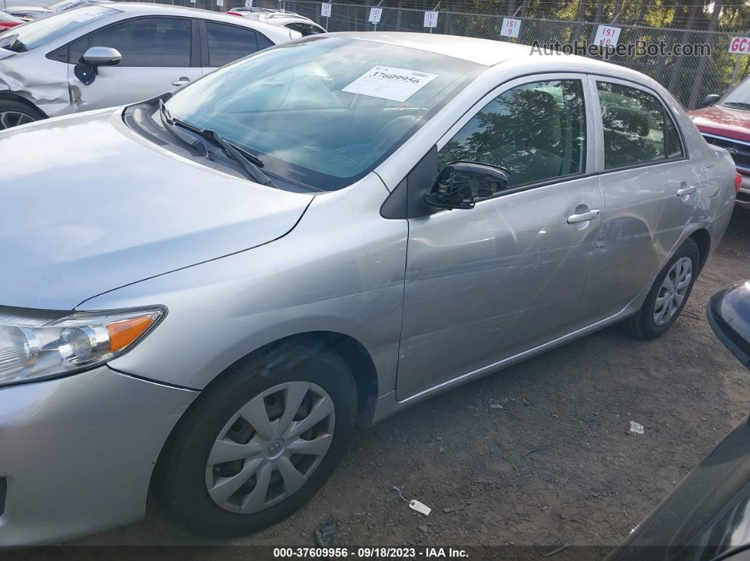 2010 Toyota Corolla   Silver vin: JTDBU4EE8AJ076442