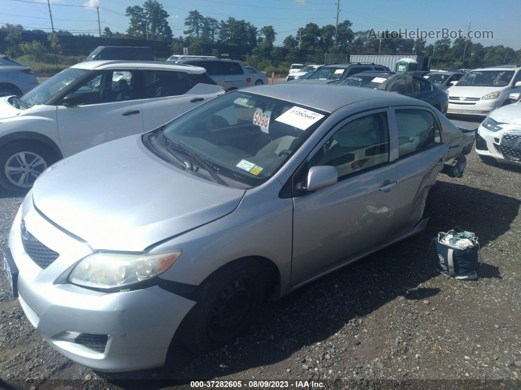 2010 Toyota Corolla   Silver vin: JTDBU4EE9A9095731