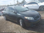 2010 Toyota Corolla Le Black vin: JTDBU4EEXAJ062395