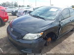 2010 Toyota Corolla Le Black vin: JTDBU4EEXAJ062395