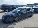 2021 Toyota Corolla Hybrid Le Black vin: JTDEAMDE0MJ010947