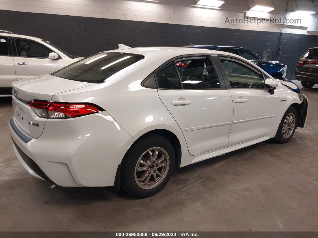 2021 Toyota Corolla Hybrid Le White vin: JTDEAMDE2MJ031749