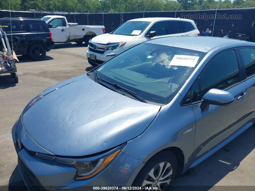 2021 Toyota Corolla Hybrid Le Blue vin: JTDEAMDE4MJ028285