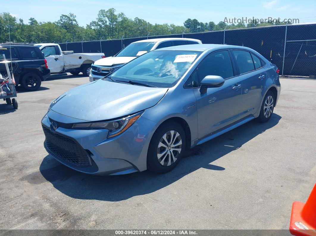 2021 Toyota Corolla Hybrid Le Blue vin: JTDEAMDE4MJ028285