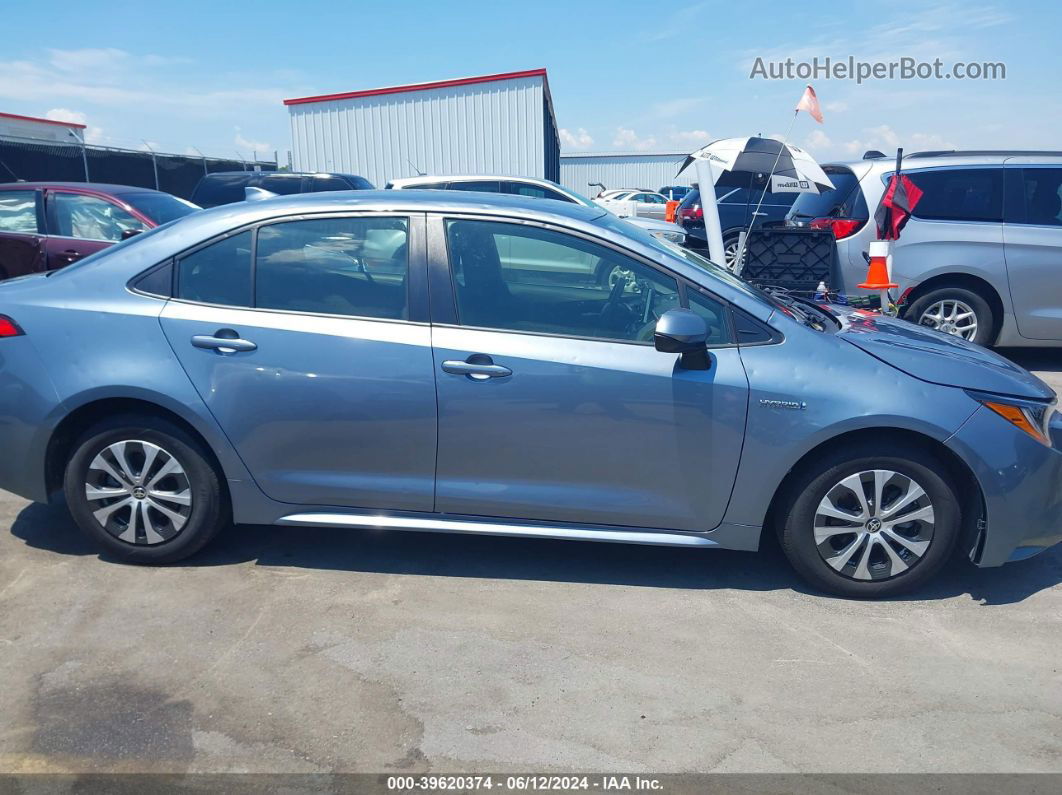 2021 Toyota Corolla Hybrid Le Blue vin: JTDEAMDE4MJ028285