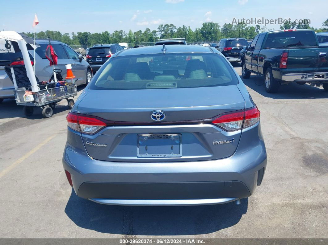 2021 Toyota Corolla Hybrid Le Blue vin: JTDEAMDE4MJ028285