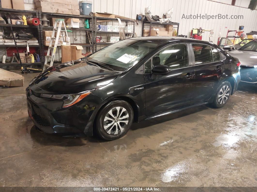 2021 Toyota Corolla Hybrid Le Black vin: JTDEAMDE4MJ030506