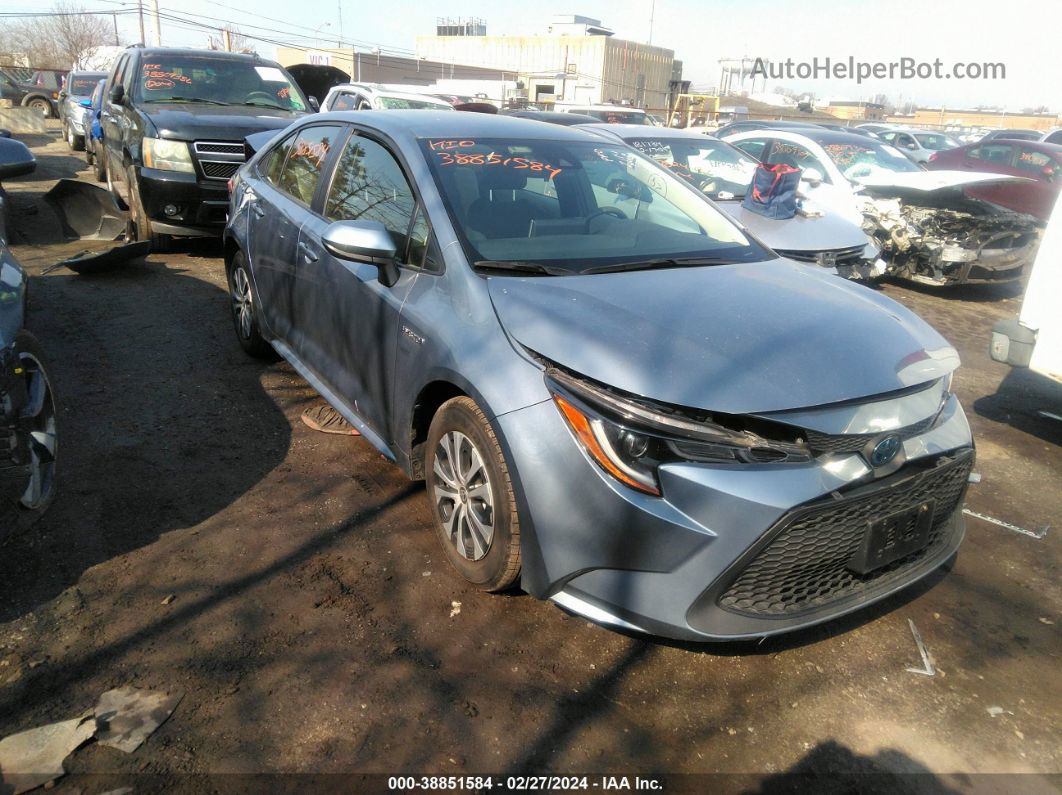 2021 Toyota Corolla Hybrid Le Light Blue vin: JTDEAMDE4MJ034345