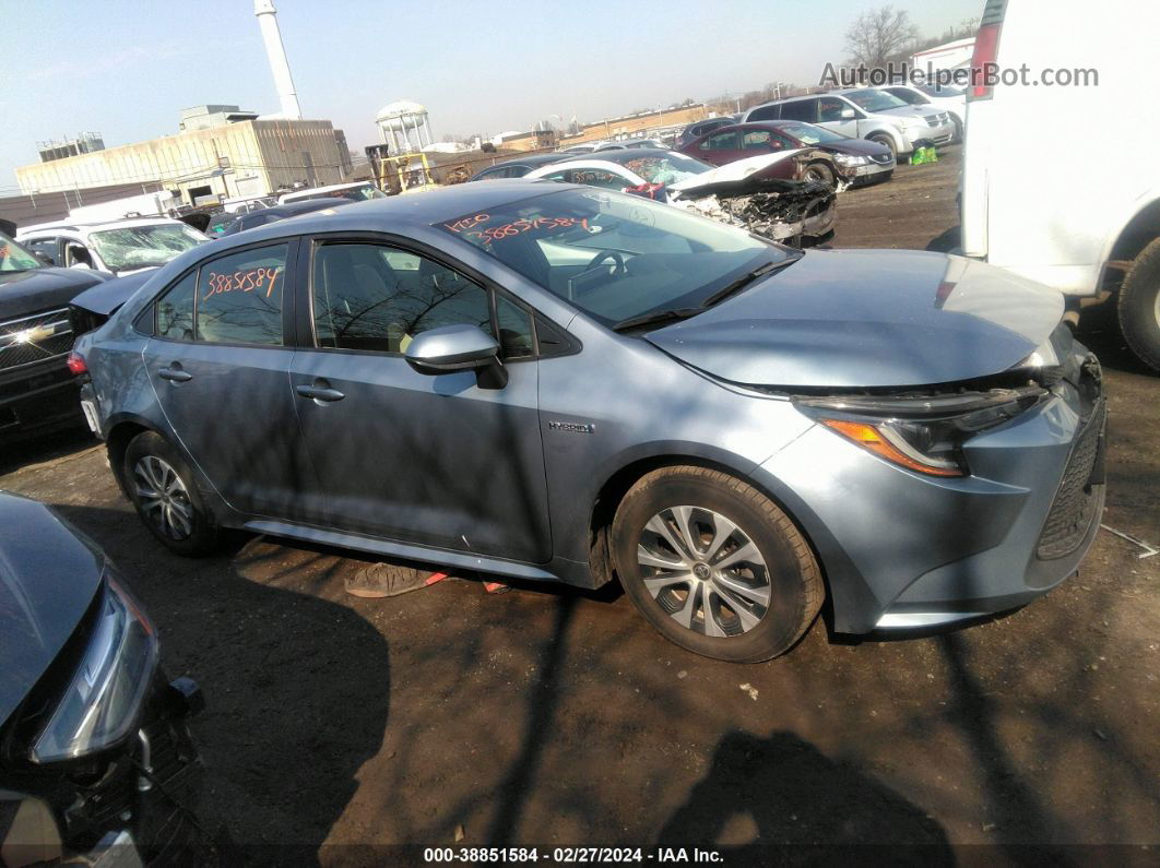 2021 Toyota Corolla Hybrid Le Light Blue vin: JTDEAMDE4MJ034345