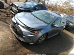 2021 Toyota Corolla Hybrid Le Light Blue vin: JTDEAMDE4MJ034345