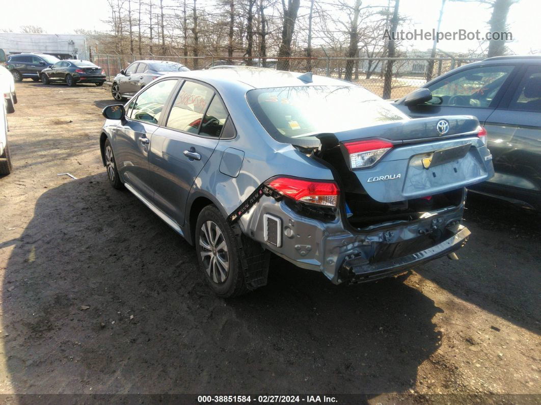 2021 Toyota Corolla Hybrid Le Light Blue vin: JTDEAMDE4MJ034345