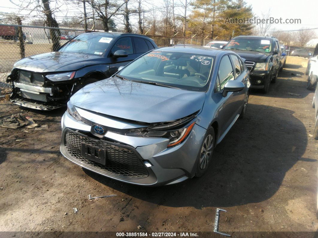 2021 Toyota Corolla Hybrid Le Light Blue vin: JTDEAMDE4MJ034345