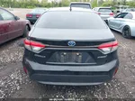 2021 Toyota Corolla Hybrid Le Black vin: JTDEAMDE5MJ000950