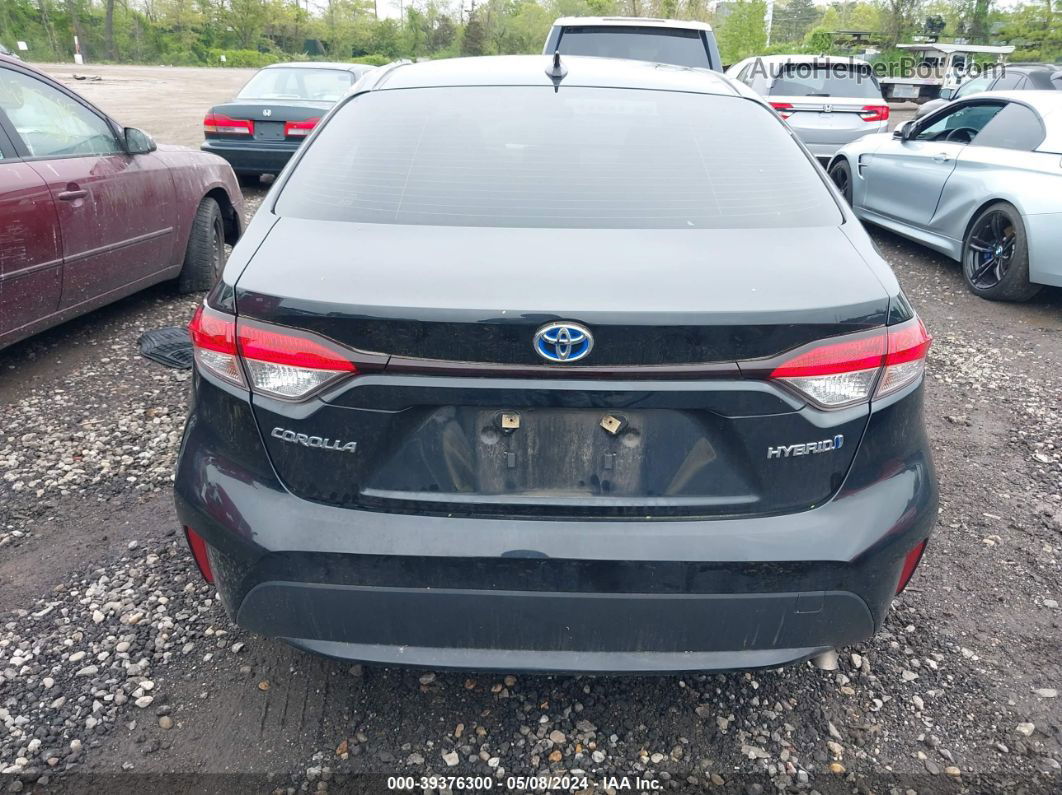 2021 Toyota Corolla Hybrid Le Black vin: JTDEAMDE5MJ000950