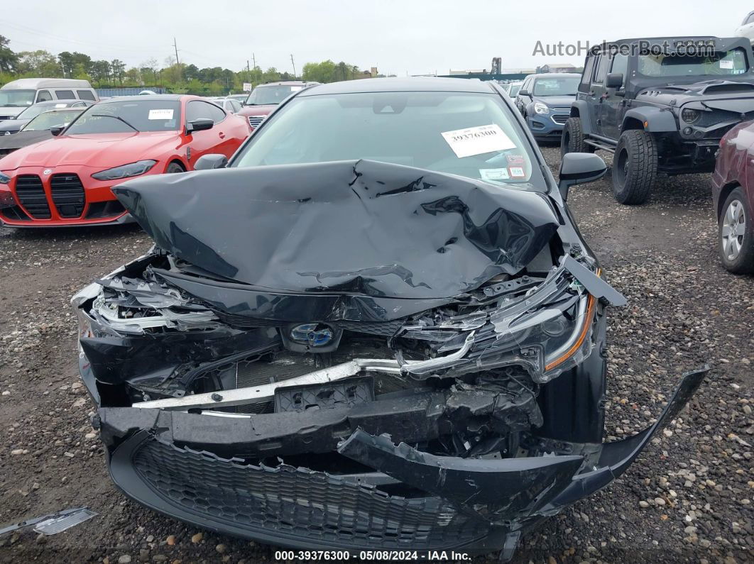 2021 Toyota Corolla Hybrid Le Black vin: JTDEAMDE5MJ000950