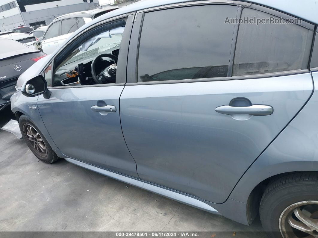 2021 Toyota Corolla Hybrid Le Blue vin: JTDEAMDE5MJ018607