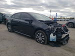 2021 Toyota Corolla Le Black vin: JTDEAMDE6MJ032323