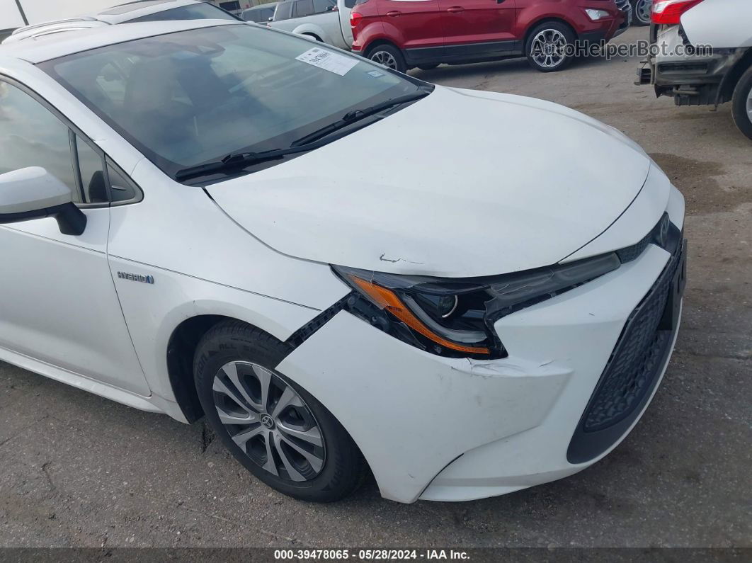 2021 Toyota Corolla Hybrid Le White vin: JTDEAMDE8MJ003292