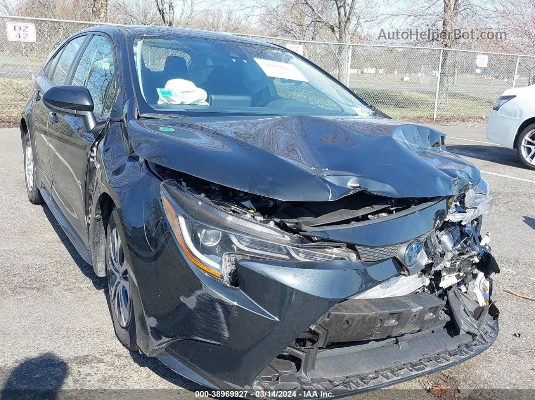 2021 Toyota Corolla Hybrid Le Black vin: JTDEAMDE8MJ014731