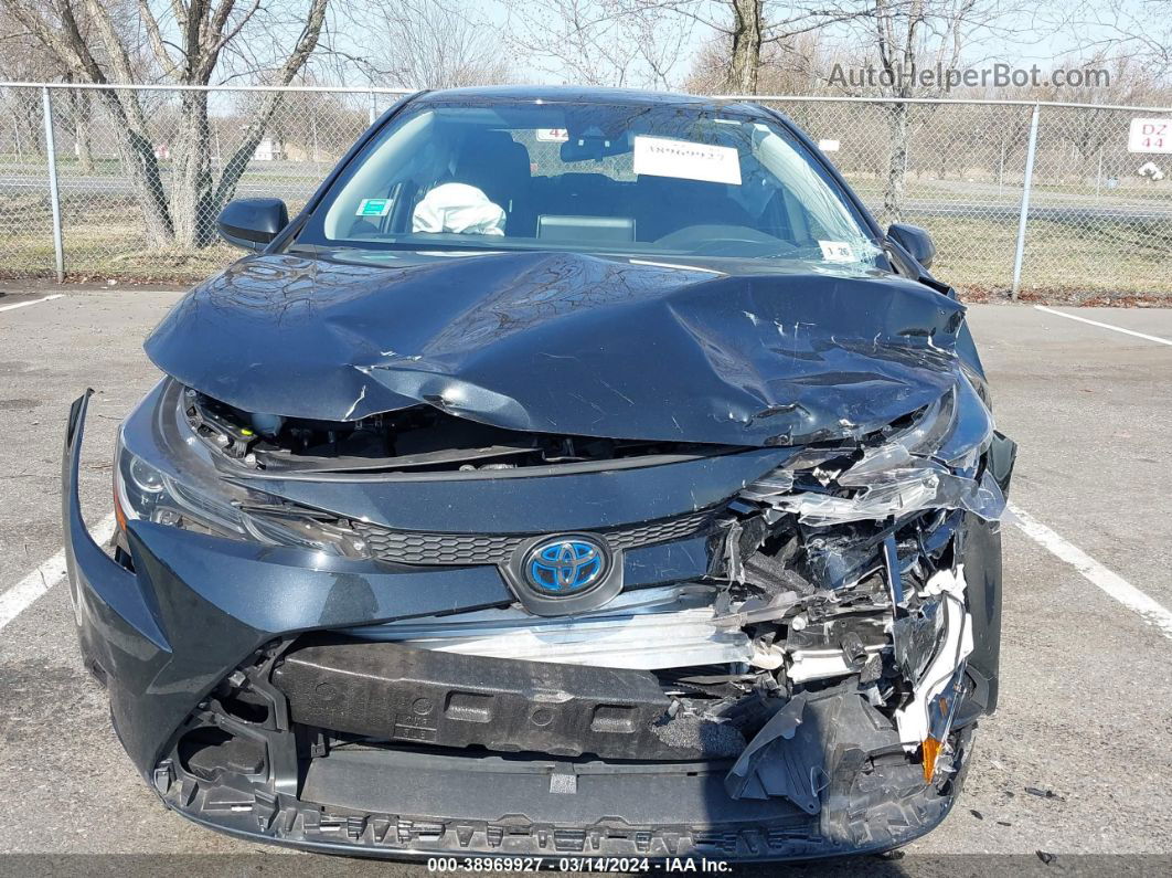 2021 Toyota Corolla Hybrid Le Black vin: JTDEAMDE8MJ014731