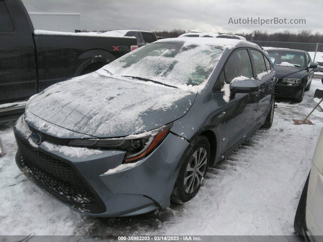 2021 Toyota Corolla Hybrid Le Blue vin: JTDEAMDE9MJ027178