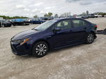 2020 Toyota Corolla Le Blue vin: JTDEBRBE4LJ009117