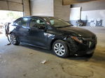 2021 Toyota Corolla Le Black vin: JTDEPMAE4MJ176553