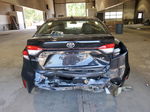 2021 Toyota Corolla Le Black vin: JTDEPMAE4MJ176553