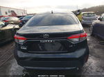 2021 Toyota Corolla Le Black vin: JTDEPMAE7MJ132269