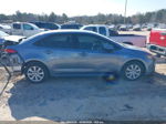 2021 Toyota Corolla Le Gray vin: JTDEPMAE7MJ141764