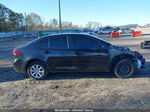 2021 Toyota Corolla Le Black vin: JTDEPMAE7MJ180189