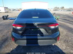 2021 Toyota Corolla Le Black vin: JTDEPMAE7MJ180189