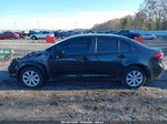 2021 Toyota Corolla Le Black vin: JTDEPMAE7MJ180189