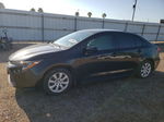 2021 Toyota Corolla Le Black vin: JTDEPMAEXMJ149907