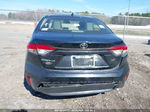 2020 Toyota Corolla Le Black vin: JTDEPRAE8LJ097821