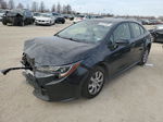 2020 Toyota Corolla Le Black vin: JTDEPRAEXLJ023901