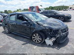 2020 Toyota Corolla Le Black vin: JTDEPRAEXLJ045784