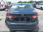 2020 Toyota Corolla Le Black vin: JTDEPRAEXLJ045784