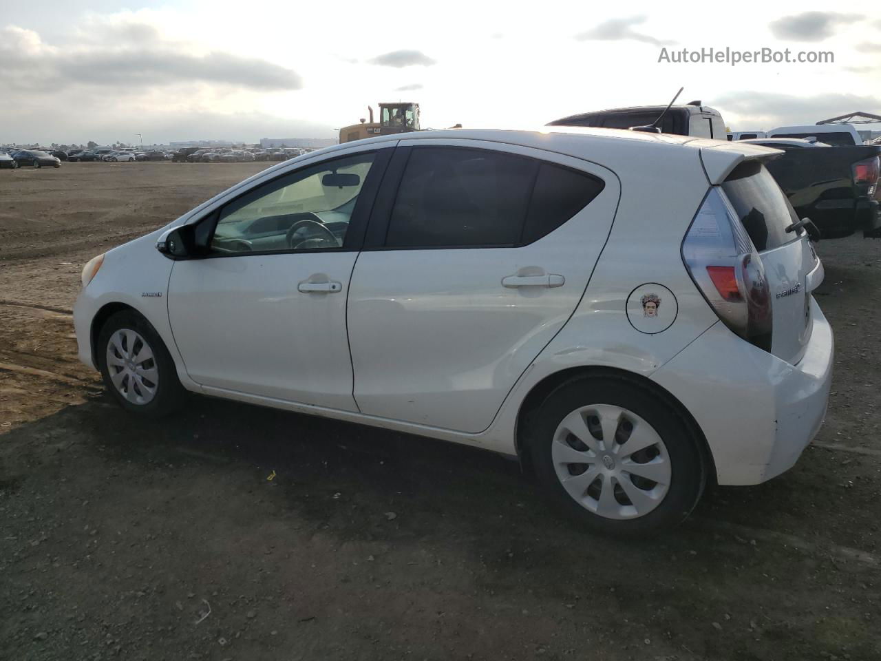 2012 Toyota Prius C  White vin: JTDKDTB30C1025386