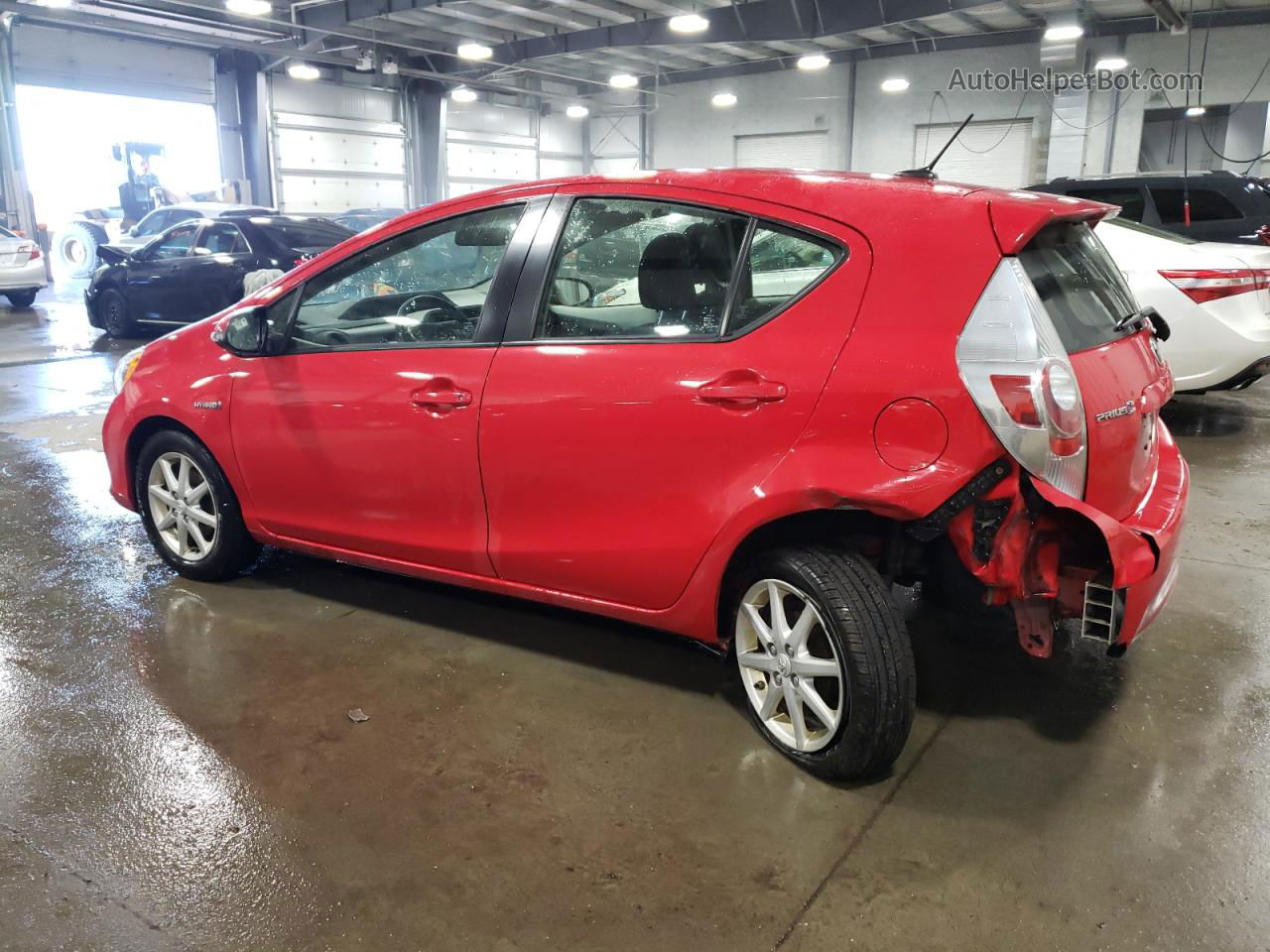 2012 Toyota Prius C  Red vin: JTDKDTB30C1028837