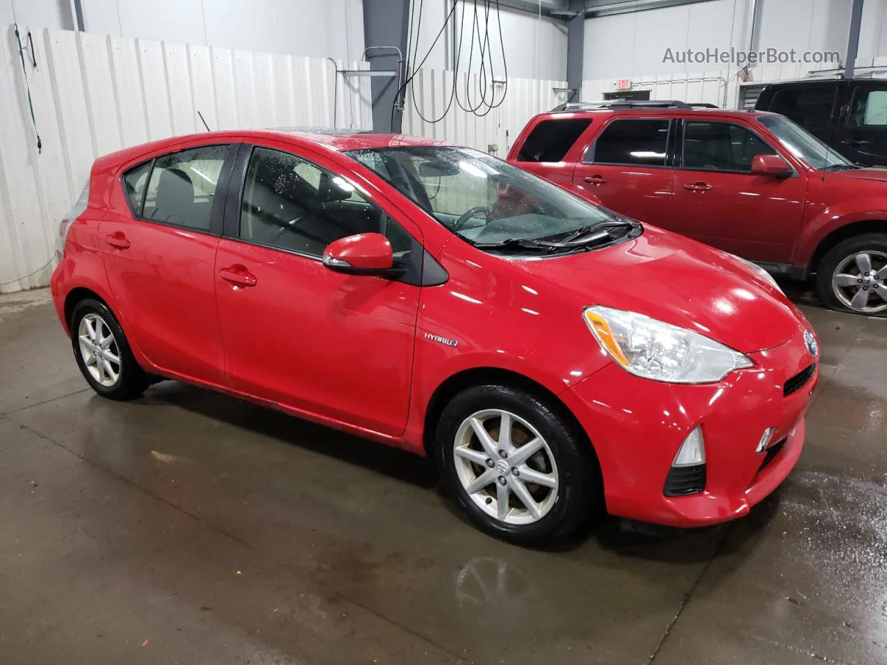 2012 Toyota Prius C  Red vin: JTDKDTB30C1028837