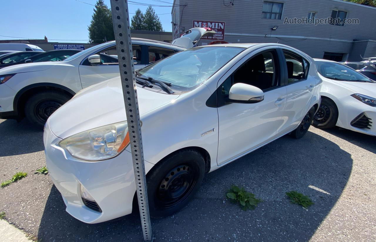 2012 Toyota Prius C  White vin: JTDKDTB30C1512457